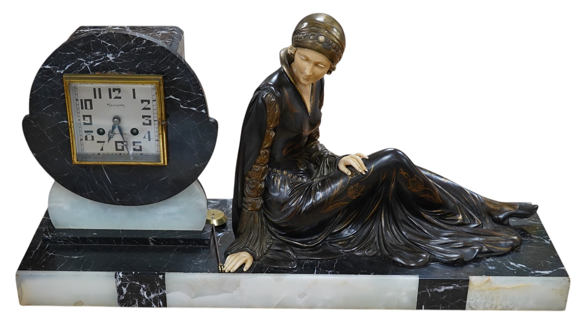 A French Art Deco black and white marble clock, with an ornately painted Spelter figure of a seated lady, width 62cm. Condition - good, unknown if clock in working order